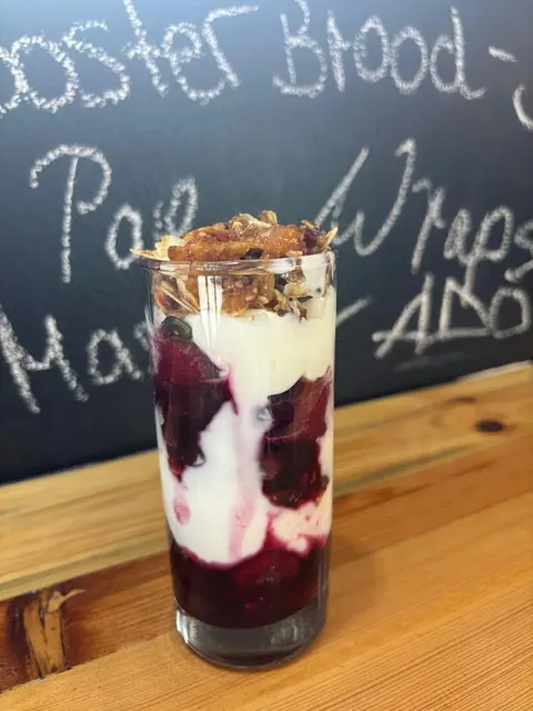 Breakfast in a Glass: berry compote, yoghurt and homemade granola.
